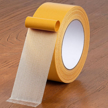 Double sided adhesive mesh tape